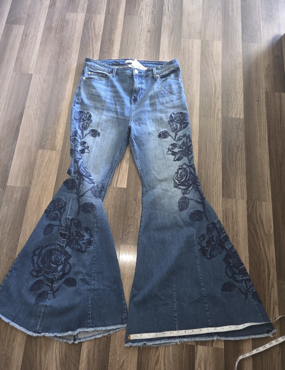 Torrid Blue Denim Super Flared Jeans with Dark Floral Print
